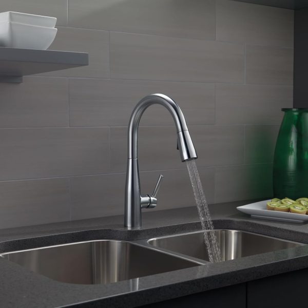 Brushed nickel kitchen faucet with drop-down spray nozzle